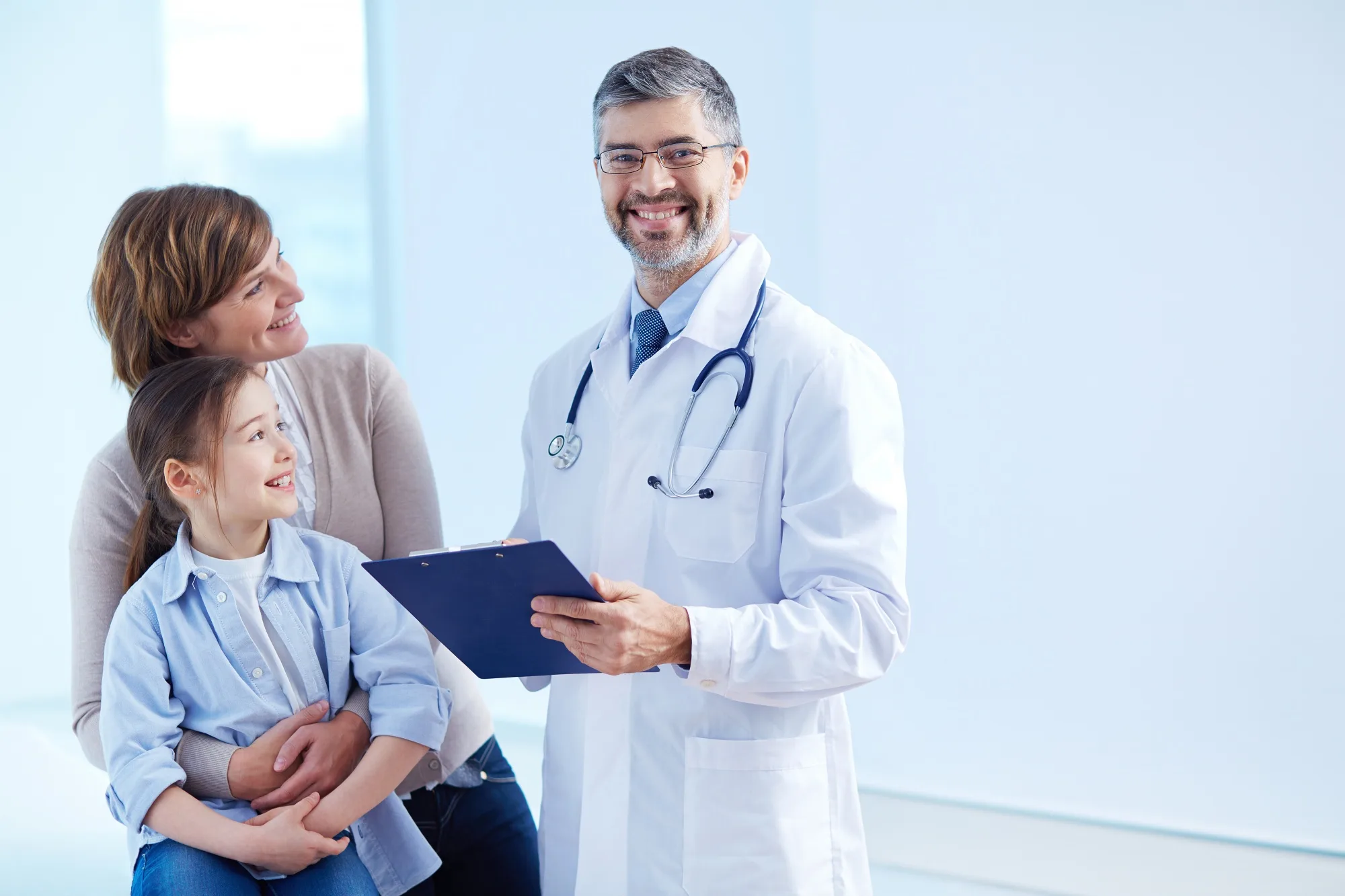 Medical professional with tablet in clinical setting